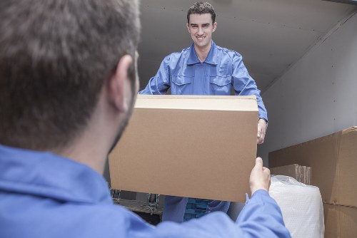 Moving truck service in Hackney Wick near mixed-use buildings