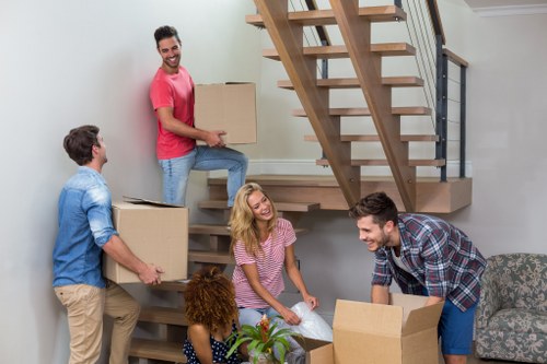 Local team handling furniture pick-up in Hackney Wick workspace