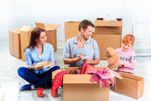 Local removals team handling furniture and boxes near Hackney Wick