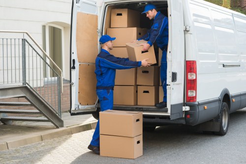 Local moving team handling furniture near Hackney Wick flats