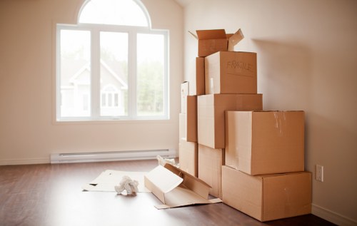 Packed boxes and furniture ready for a house move in Hackney Wick