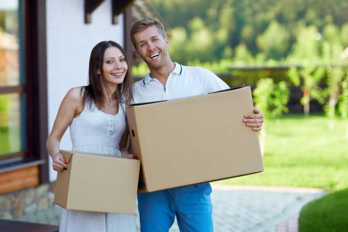 Packed office boxes and furniture prepared for relocation
