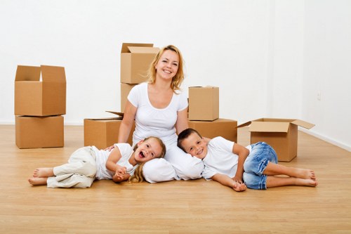 Office furniture and packed boxes ready for a local commercial move
