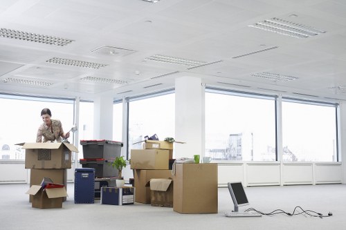 Packed moving boxes and furniture in a Hackney Wick home